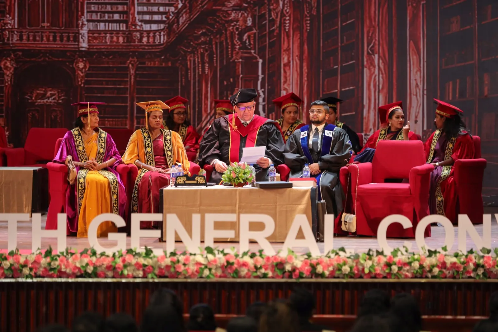 Academic leaders on stage during a convocation ceremony in Colombo